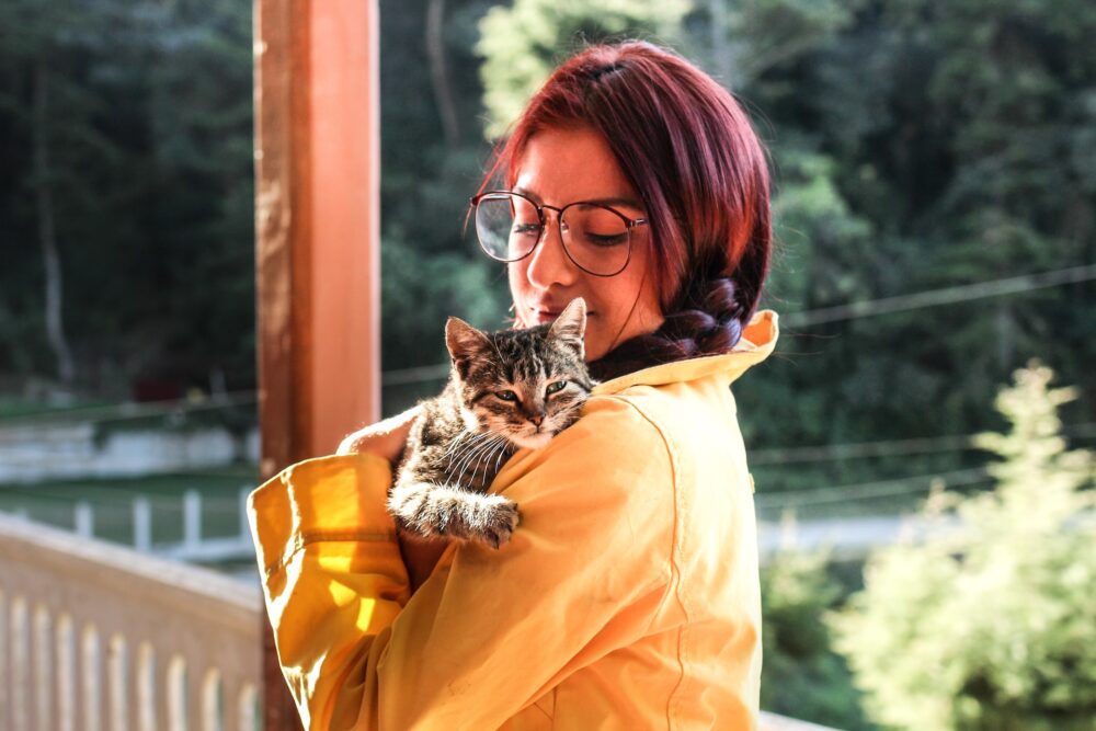woman with newly adopted cat